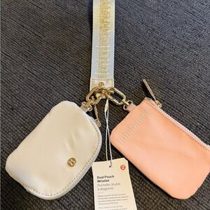 Lululemon Athletica Cream and Pink Wristlet Set